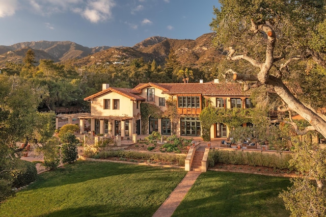 815 Hot Springs Rd, Montecito, CA 93108 - view of front of home featuring a patio, a mountain view, and a front yard