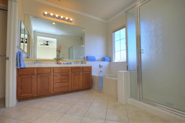 bathroom featuring ceiling fan, tile patterned floors, crown molding, shower with separate bathtub, and vanity