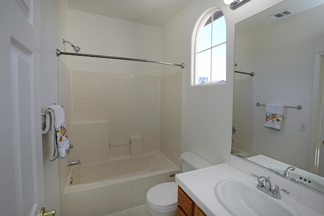 full bathroom featuring shower / tub combination, vanity, and toilet