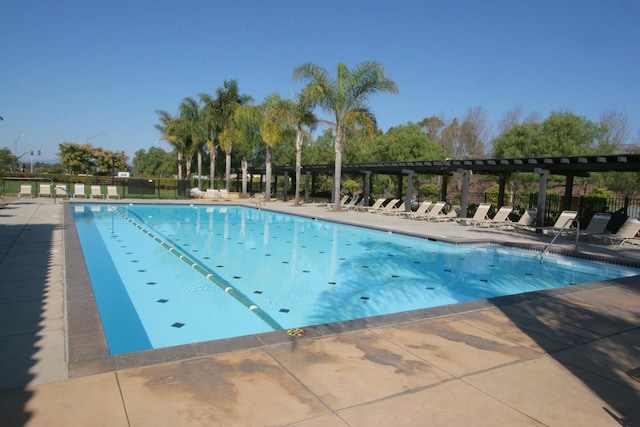 view of swimming pool with a patio area