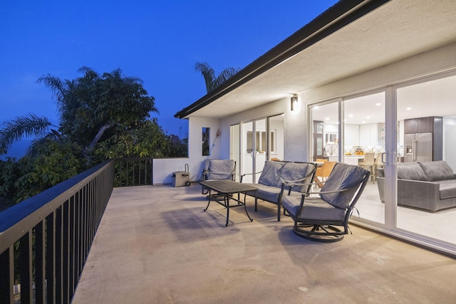 view of patio with a balcony