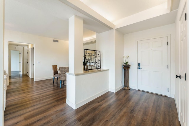 entrance foyer with dark hardwood / wood-style flooring