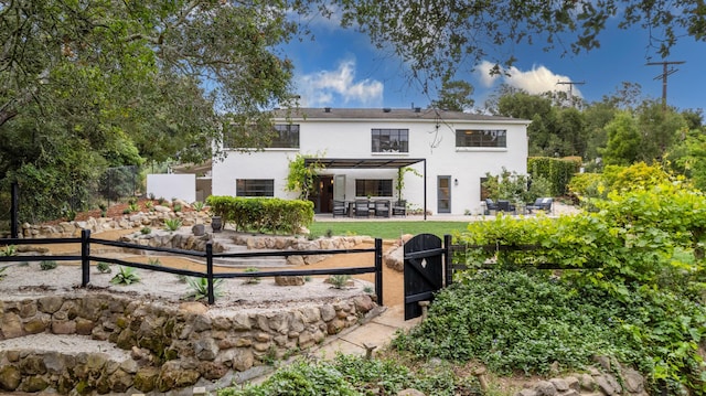 792 Chelham Way, Santa Barbara, CA 93108 - view of front of property with stucco siding, a patio area, a fenced backyard, and a gate