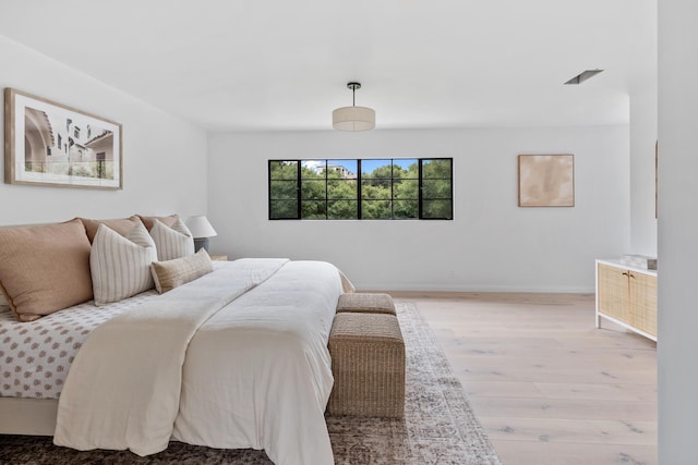 bedroom featuring light hardwood / wood-style flooring