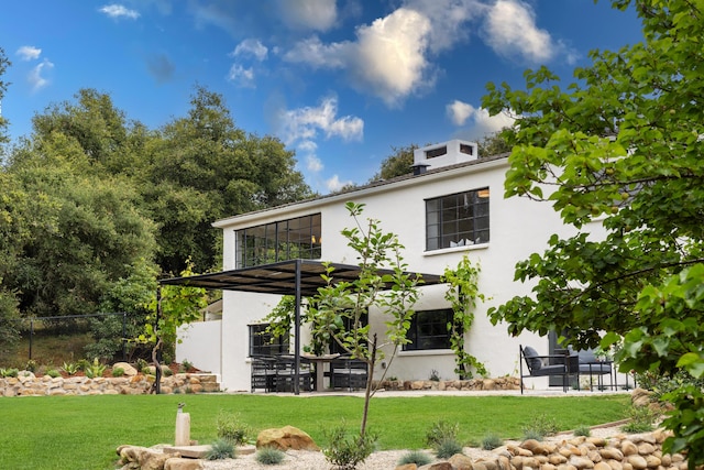 792 Chelham Way, Santa Barbara, CA 93108 - rear view of property with stucco siding and a patio