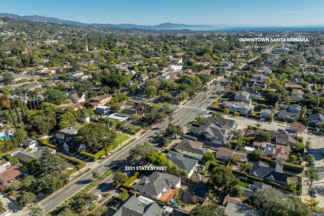 drone / aerial view featuring a mountain view