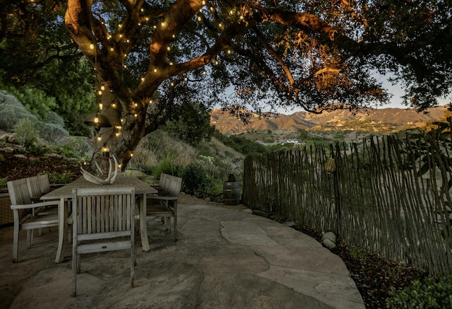 view of patio / terrace with a mountain view