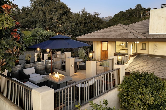 exterior space with an outdoor fire pit