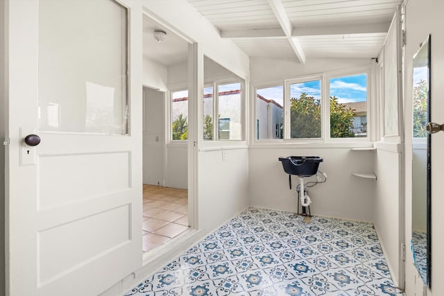 bathroom featuring lofted ceiling with beams and wood ceiling