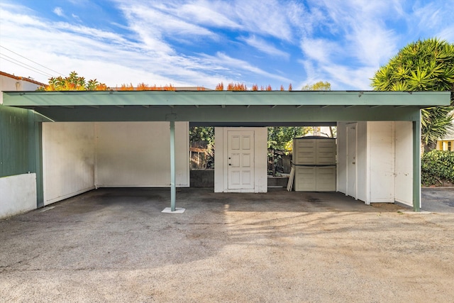 view of parking / parking lot with a carport