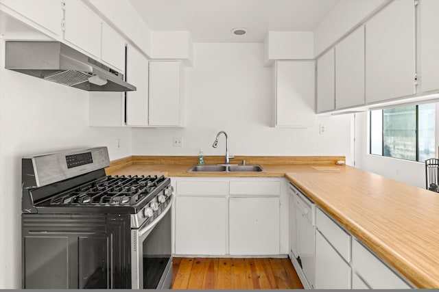 kitchen with extractor fan, sink, dishwasher, white cabinets, and stainless steel gas stove