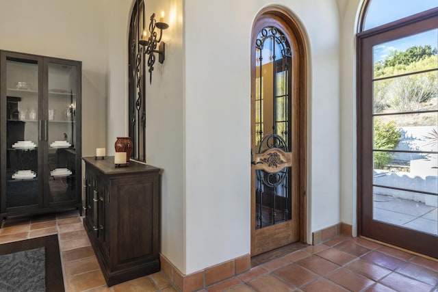 tiled entrance foyer with french doors