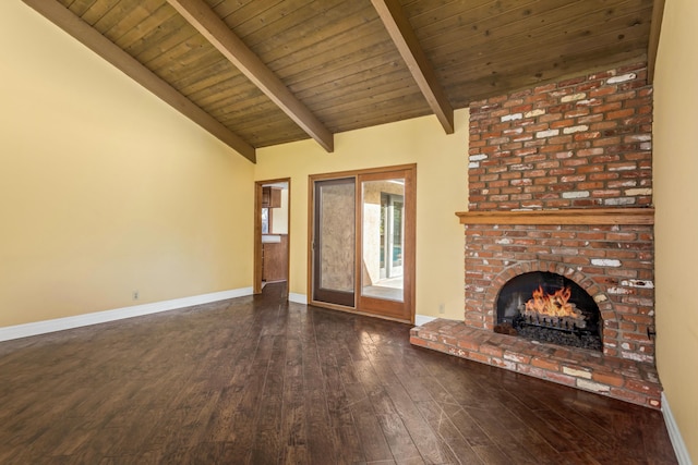 unfurnished living room with a fireplace, lofted ceiling with beams, wooden ceiling, and dark wood-type flooring