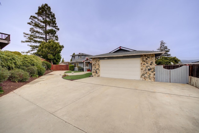 ranch-style house featuring a garage