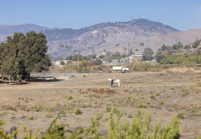 property view of mountains featuring a rural view