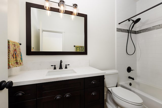 full bathroom featuring vanity, toilet, and tiled shower / bath combo