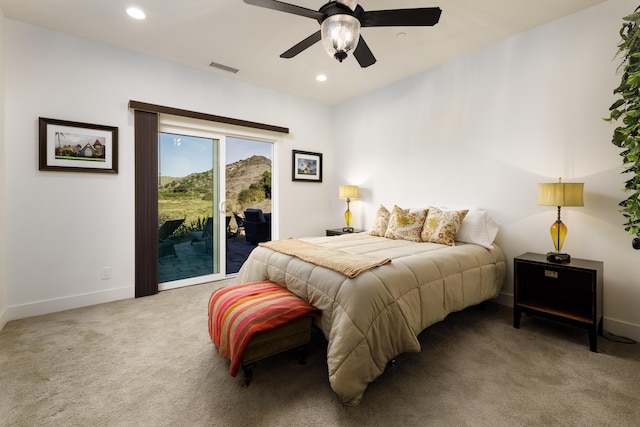 carpeted bedroom featuring access to outside and ceiling fan