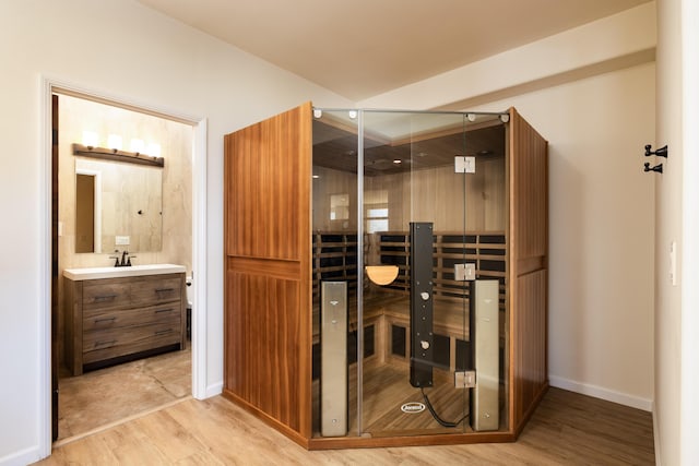 view of sauna / steam room featuring hardwood / wood-style flooring