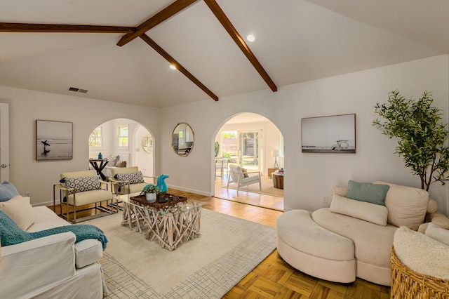 living room with lofted ceiling with beams, arched walkways, baseboards, visible vents, and recessed lighting