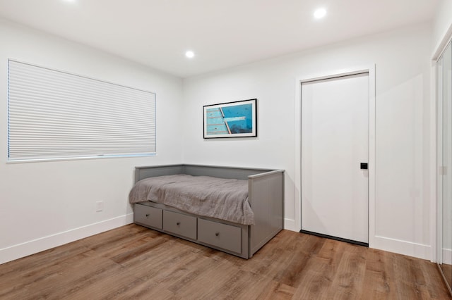 bedroom featuring light wood-type flooring