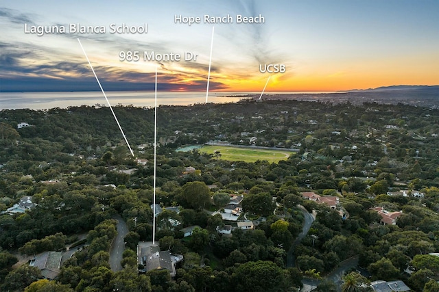 birds eye view of property featuring a water view