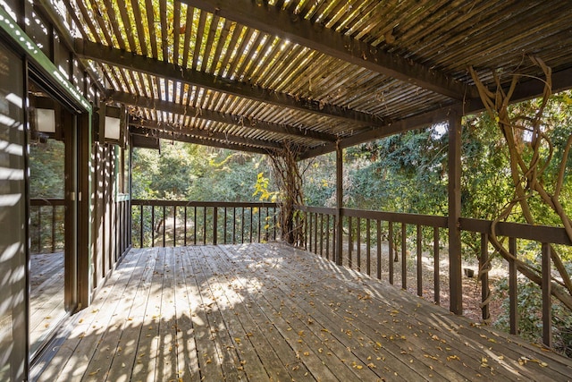 wooden deck featuring a pergola