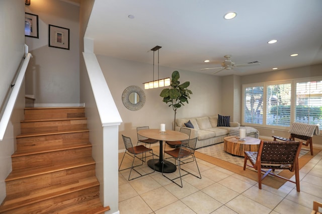 living area featuring baseboards, ceiling fan, stairs, light tile patterned flooring, and recessed lighting