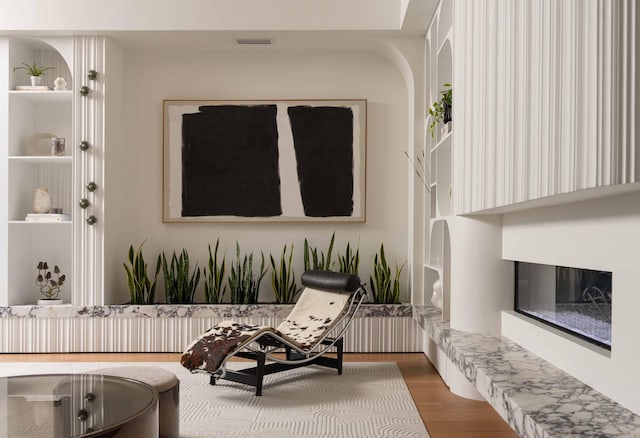 living area featuring hardwood / wood-style floors