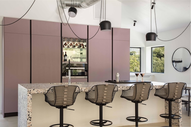 kitchen featuring light stone counters