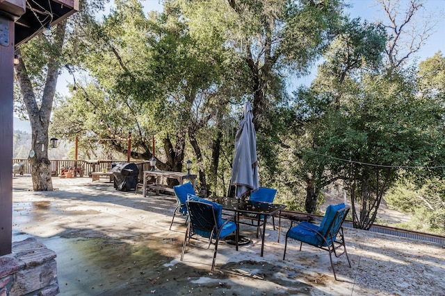 view of patio featuring a grill