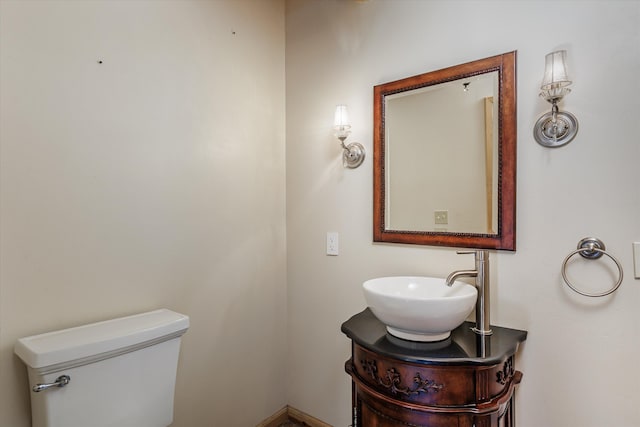 bathroom with vanity and toilet