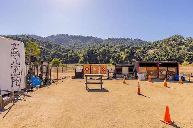 surrounding community with a mountain view