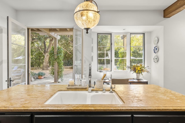 kitchen with sink and hanging light fixtures