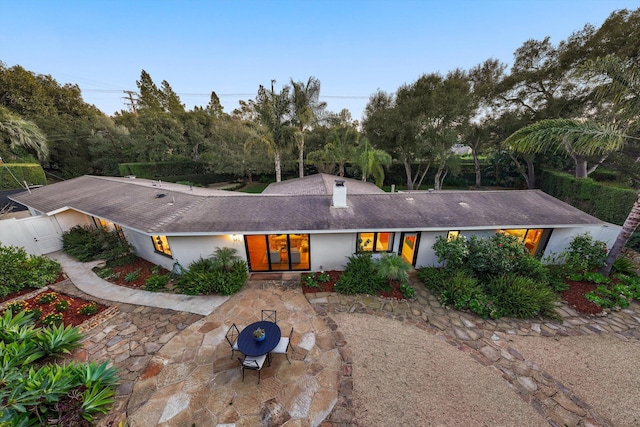 view of front of home with a patio area