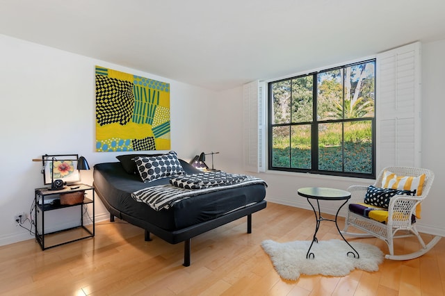 bedroom featuring light wood-type flooring