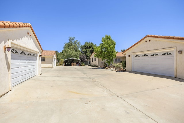 view of side of property featuring a carport