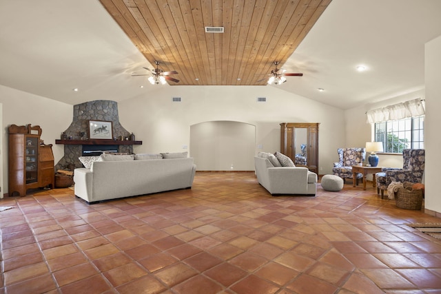 living room featuring ceiling fan, wooden ceiling, and vaulted ceiling