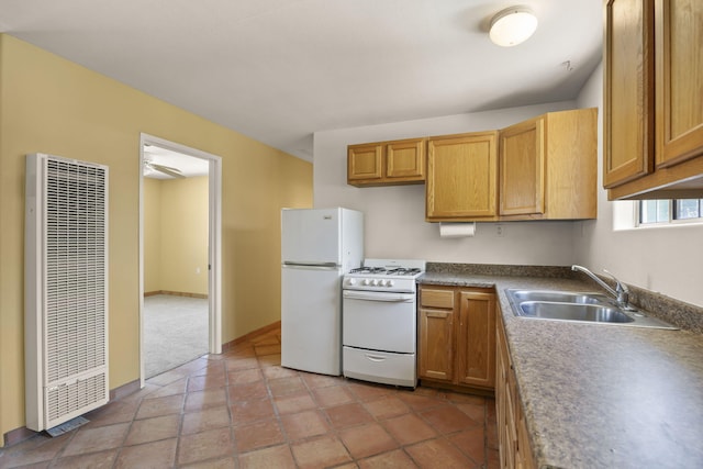 kitchen with white appliances and sink