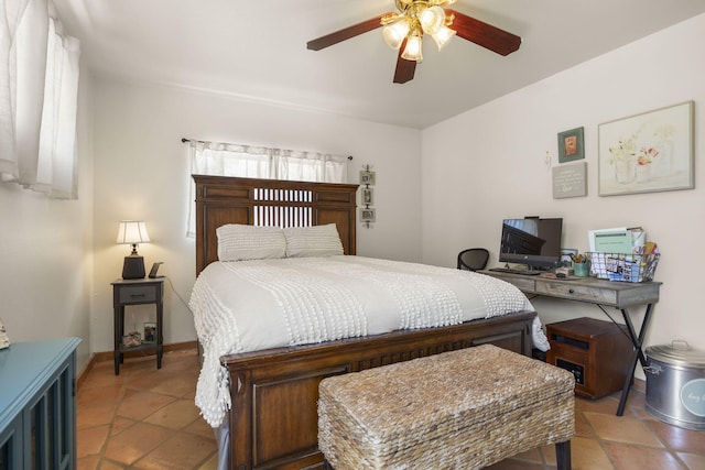 tiled bedroom with ceiling fan