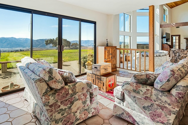 sunroom / solarium with a mountain view