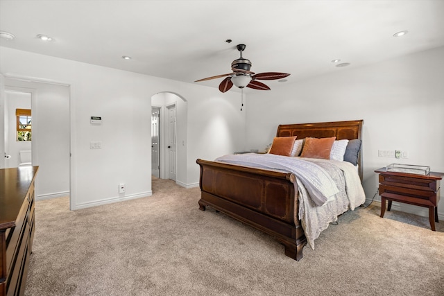 carpeted bedroom with ceiling fan