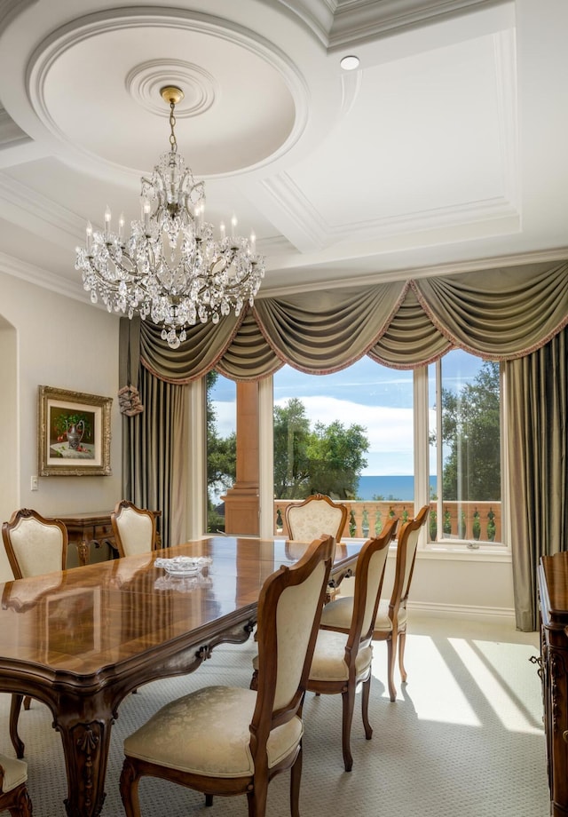 carpeted dining area featuring ornamental molding, a healthy amount of sunlight, a chandelier, and coffered ceiling