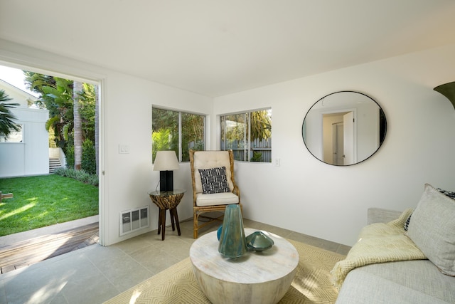 sitting room with light tile patterned flooring