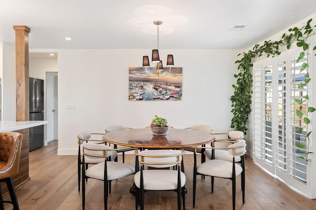 dining room featuring light hardwood / wood-style floors