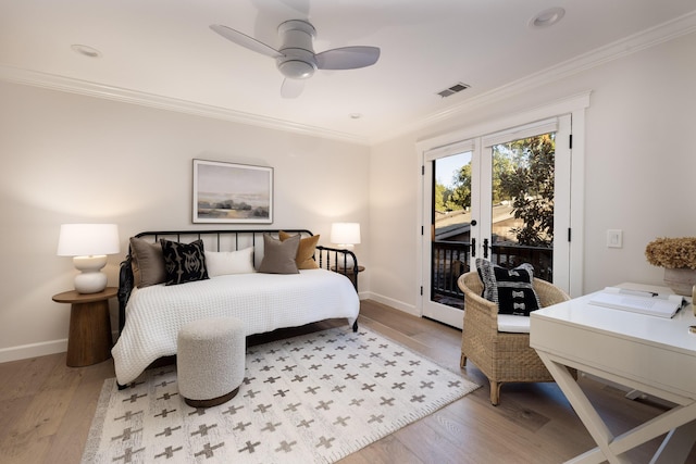 bedroom with french doors, ceiling fan, access to exterior, light wood-type flooring, and ornamental molding