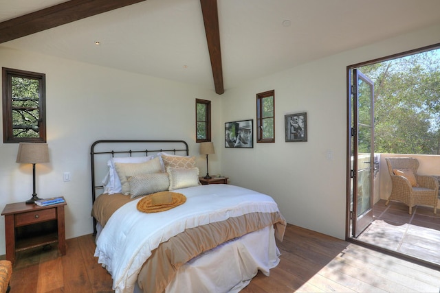 bedroom featuring access to exterior, wood-type flooring, and beamed ceiling