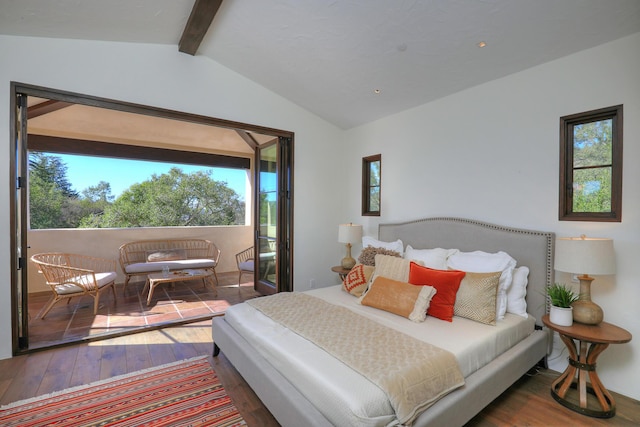 bedroom featuring vaulted ceiling with beams and wood-type flooring