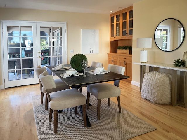 dining space featuring light hardwood / wood-style flooring