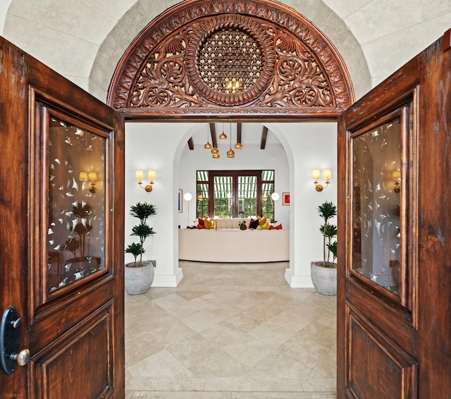 foyer entrance with vaulted ceiling