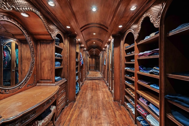 wine room featuring wood ceiling and wood-type flooring